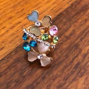 Colorful flowers golden ring with diamonds